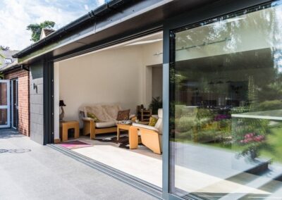 aïr aluminium sliding doors framing a landscaped garden