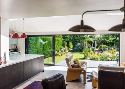 Interior view of aïr sliding doors in a light-filled extension