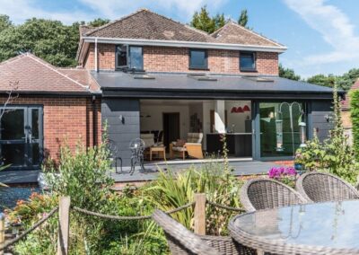 aïr sliding doors in a rear extension with open-plan kitchen and dining