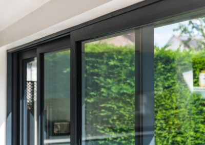 Garden viewed through aïr sliding doors in open position