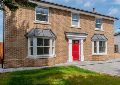 Bereco aluminium bifold doors open to rear garden, Reflecting Tradition project