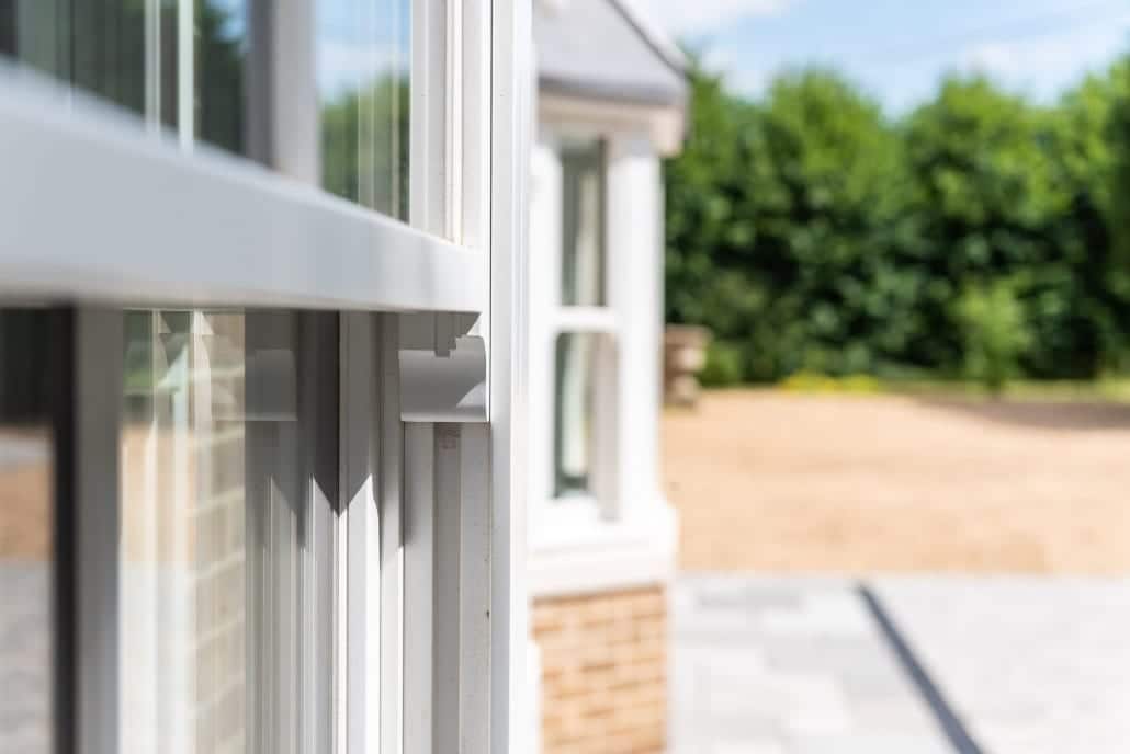 Bereco timber sash windows and Smarts aluminium bifold doors on an elegant Victorian-style family home