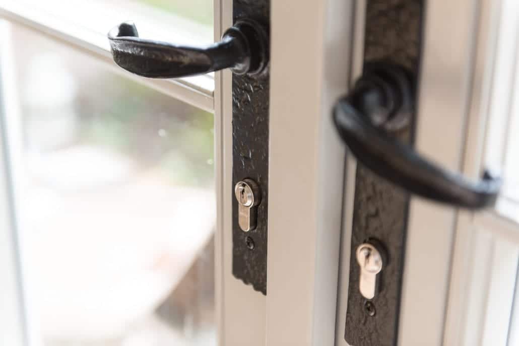 Bereco timber windows with monkey-tail ironmongery on former Post Office