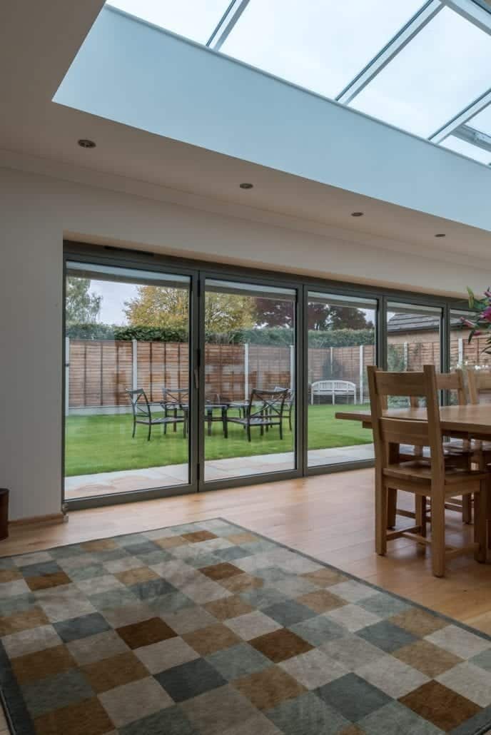 Portrait view of the lantern roof and bifold doors from inside the extension