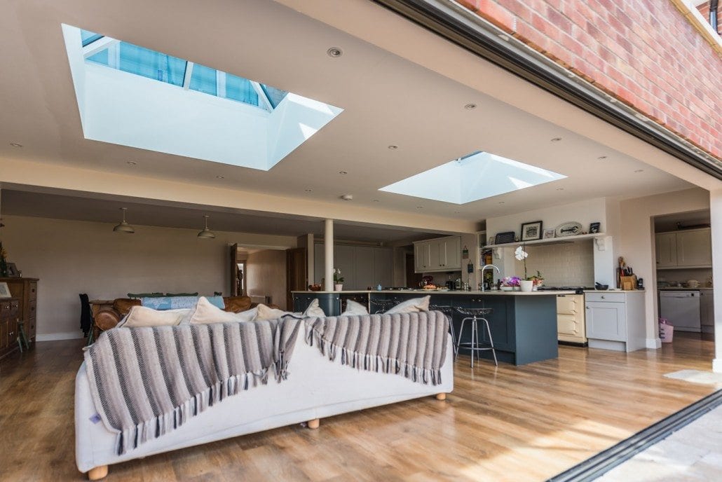 Aluminium bifold doors and roof lanterns combined on a large extension