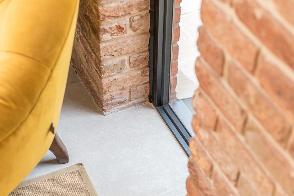 uPVC tilting sash windows with traditional style fittings and profiles on the property
