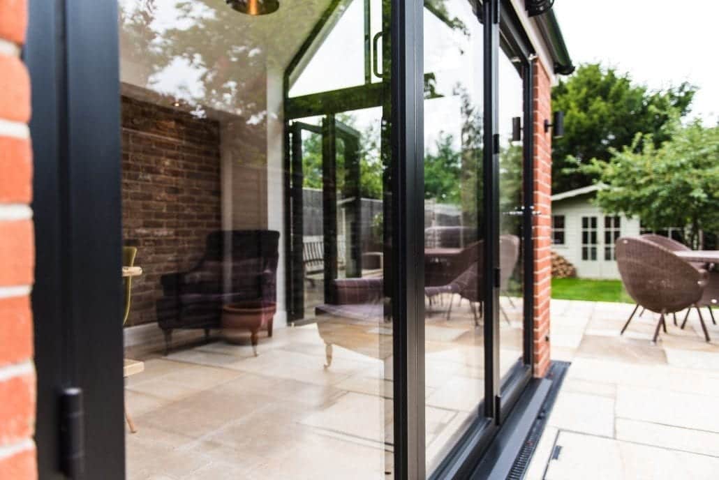 Smarts Alitherm 300 bifold doors fully open on Colchester Edwardian extension