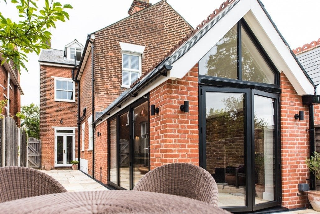 Smarts bifold doors with exposed brickwork on Edwardian property
