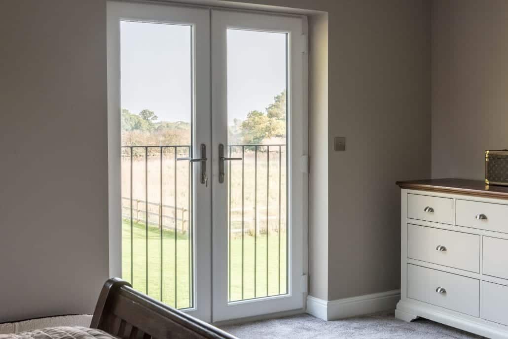 Composite front door in anthracite grey with white interior finish