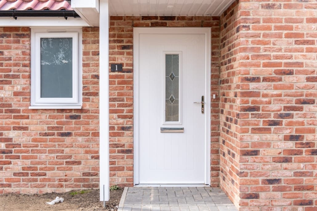 Duraflex windows and Residor composite doors across multiple bungalow units