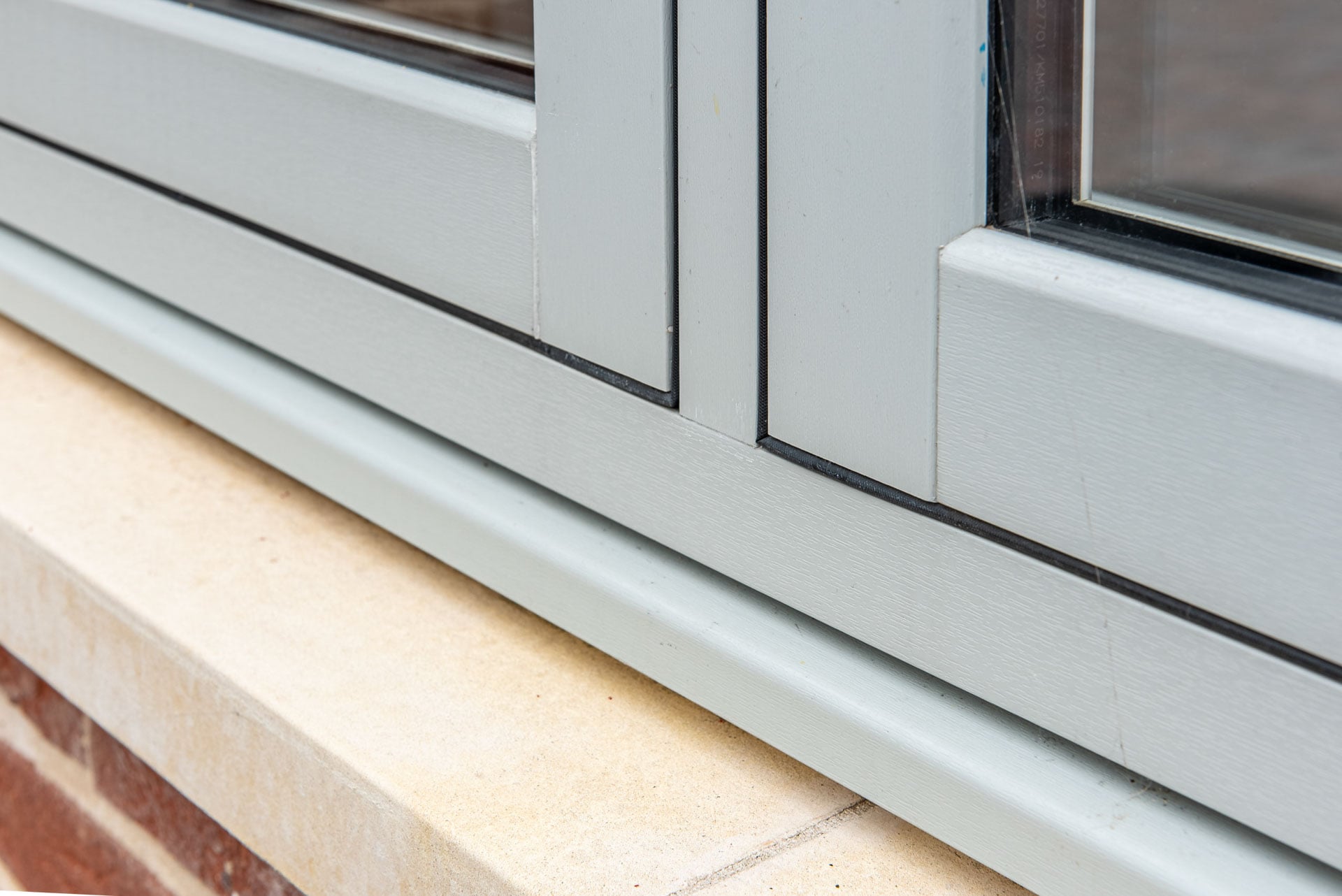 Smarts bifold doors fully open connecting indoor living space with the garden