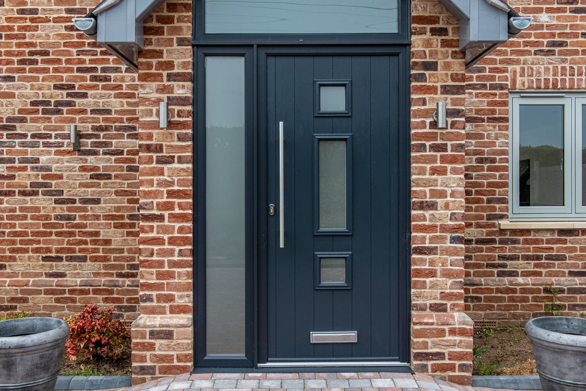 Comp Door composite door in green with glazed panels, Windows Etc