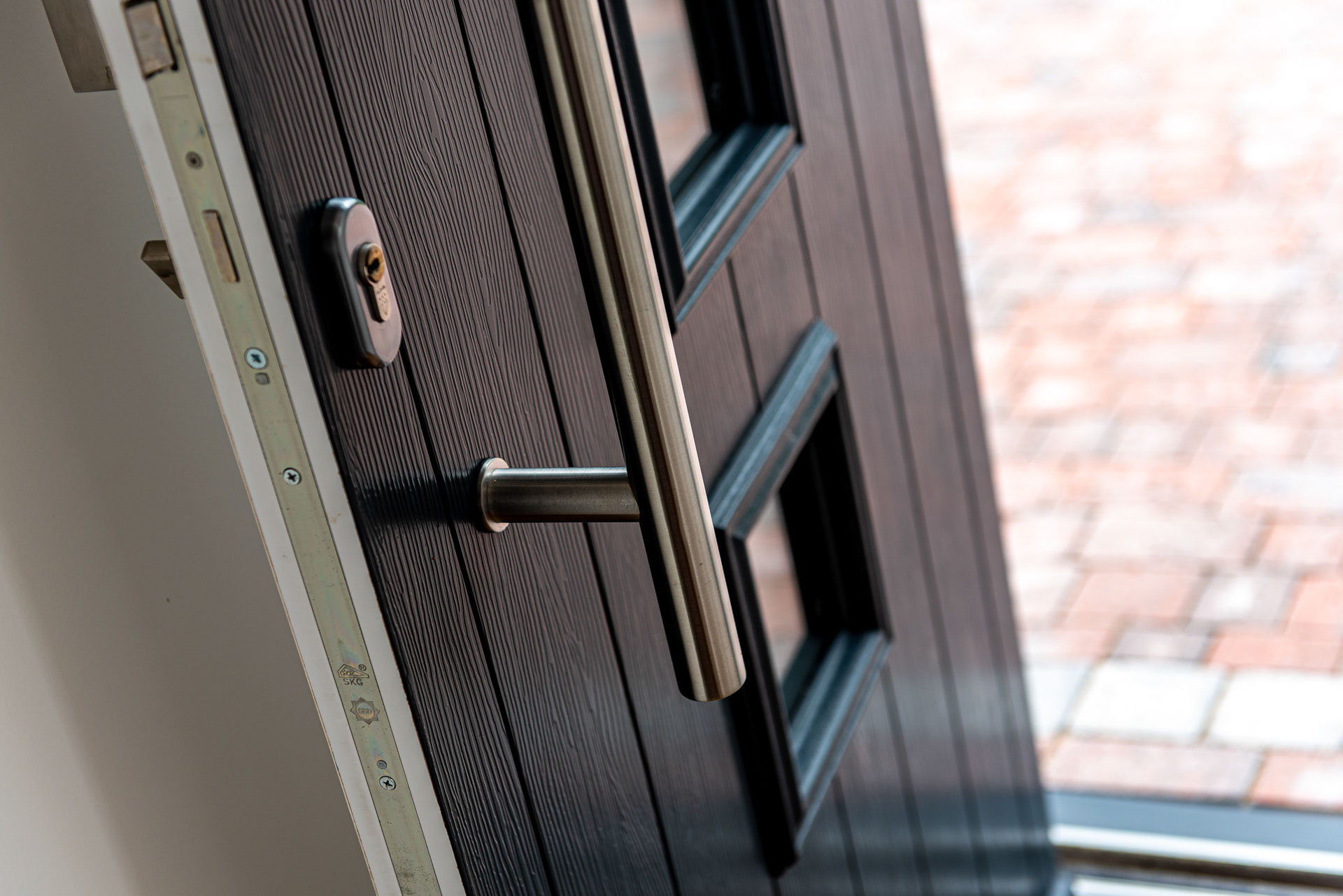 Etched glass door panel with ring knocker, Solidor, Windows Etc