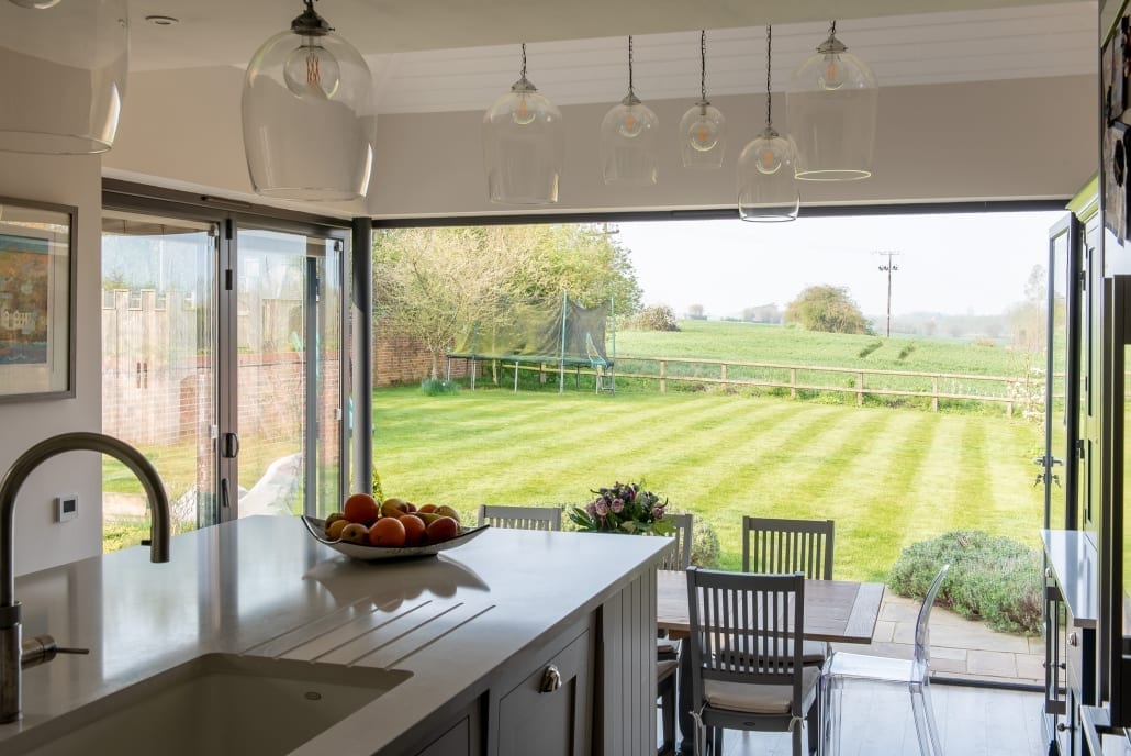 Interior view of Origin offset bifold doors on an Essex kitchen extension