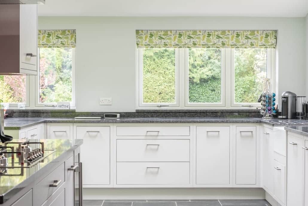 Flush sash windows and aluminium bifold doors on an Essex village home extension