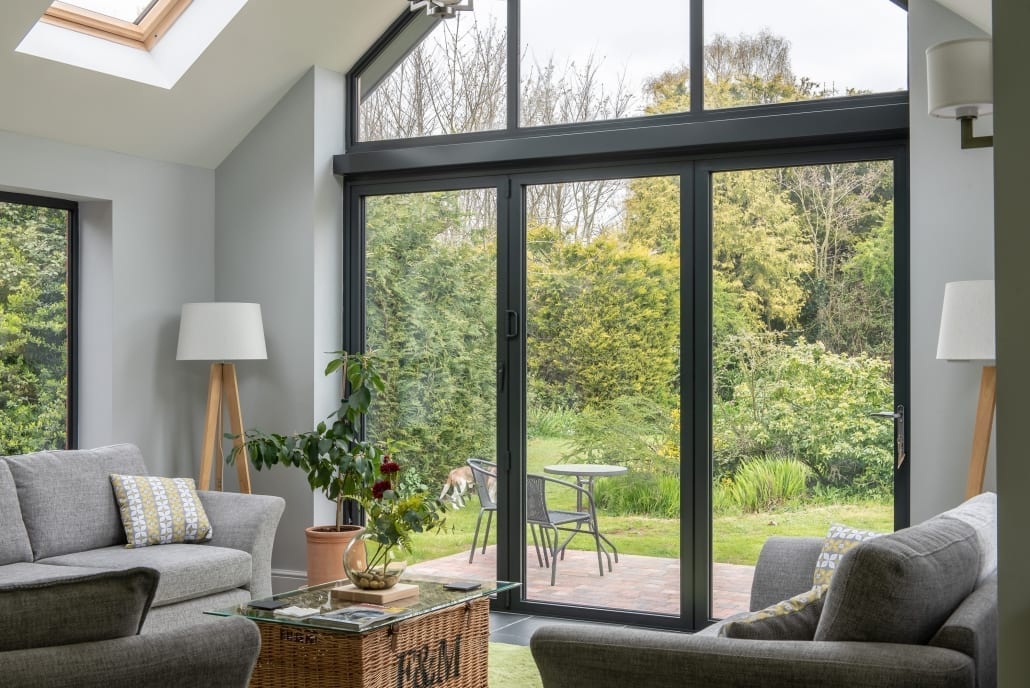 Aluminium bifold doors opening to garden, One of Grey Gables extension