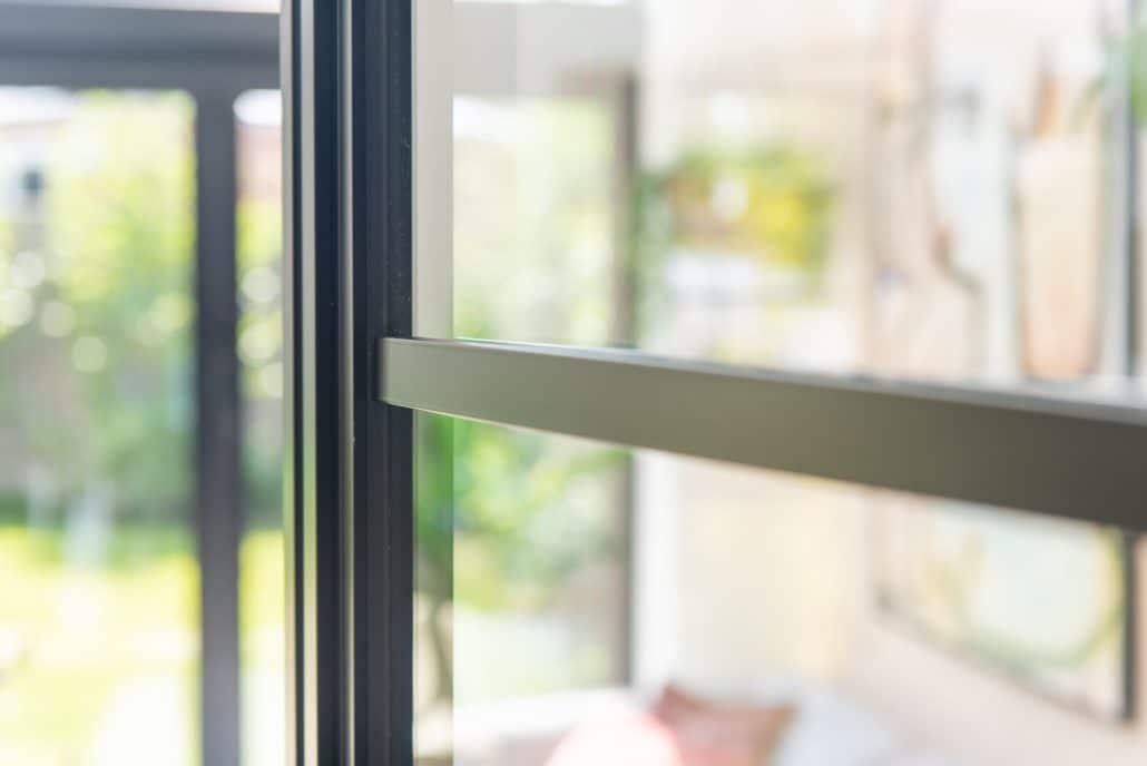 Heritage 47 rear glazed extension, double doors flanked by fixed glazing for room continuity