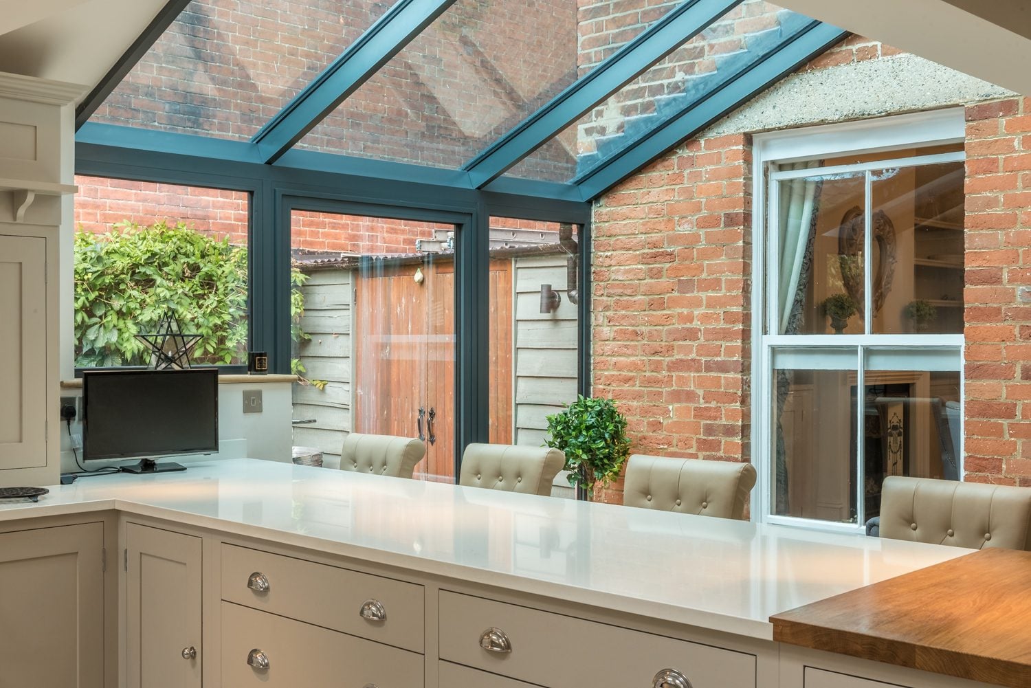 Anthracite lean-to glazed extension on a Victorian family home