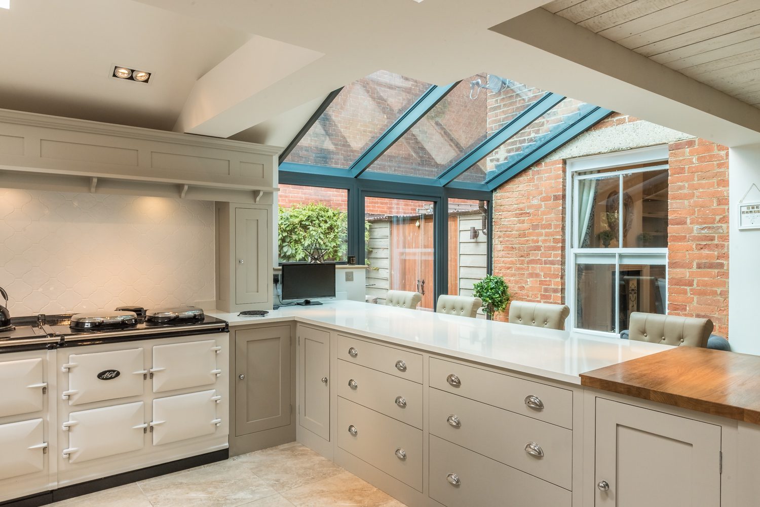 Lean-to extension with large glass sections, Lean on Me project