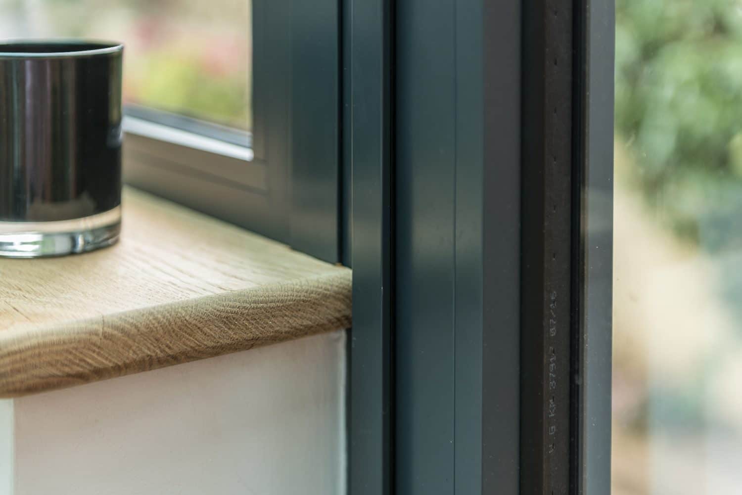 Lean-to extension exterior, dark frames with original lead-work windows