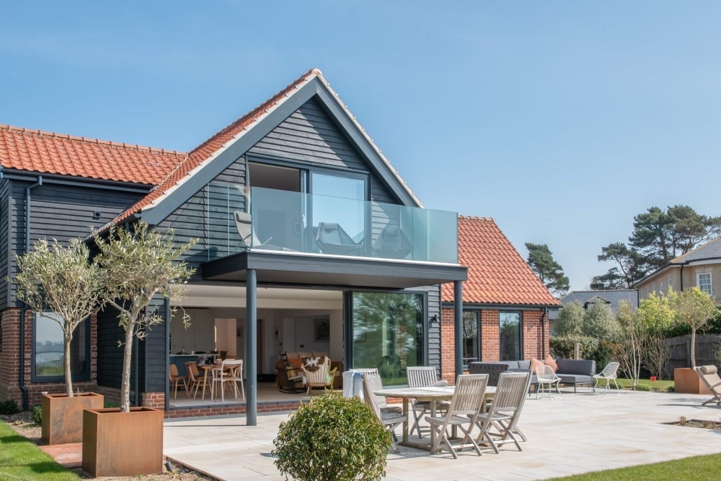 Balcony with aïr sliding doors and estuary views, Home by the Sea Suffolk