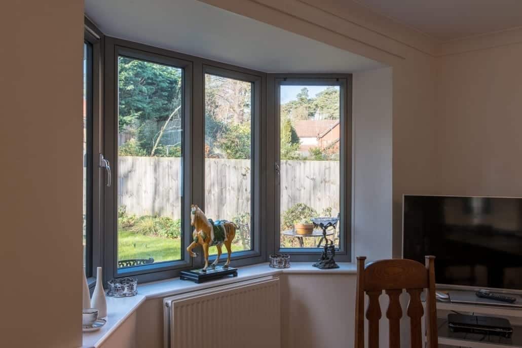 Origin aluminium flush sash windows on a 1990s detached house