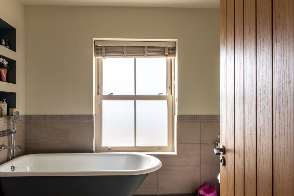 uPVC sliding sash window above bath, Windows Etc Colchester Essex