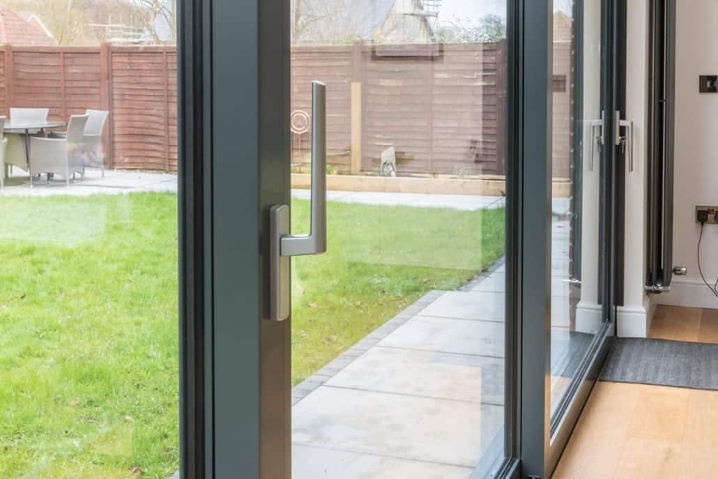 Anthracite grey uPVC flush sash windows on a modern family home