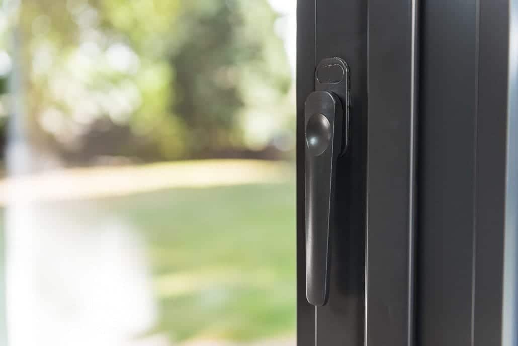 Corner glass configuration with Smarts bifold doors maximising garden views