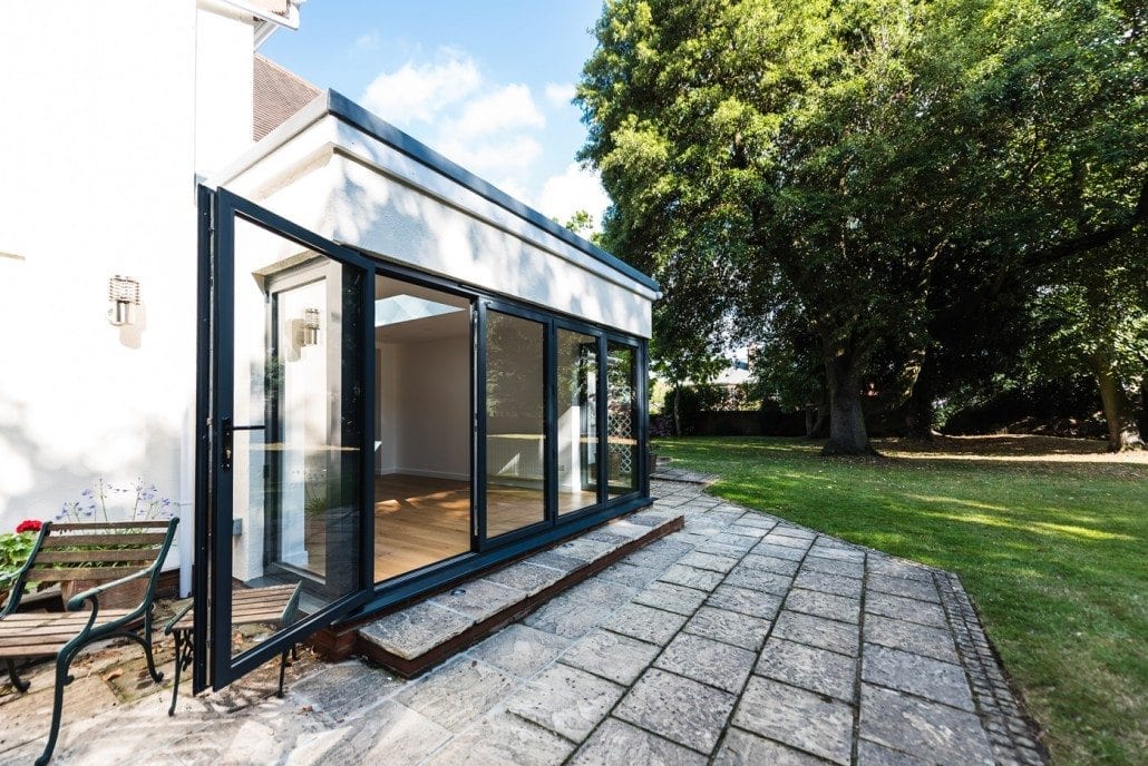 Four-section Smarts bifold doors in anthracite grey, Kelvedon conservatory project