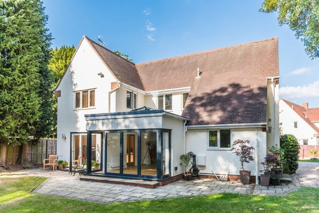 Smarts bifold doors folded back to reveal the full garden opening