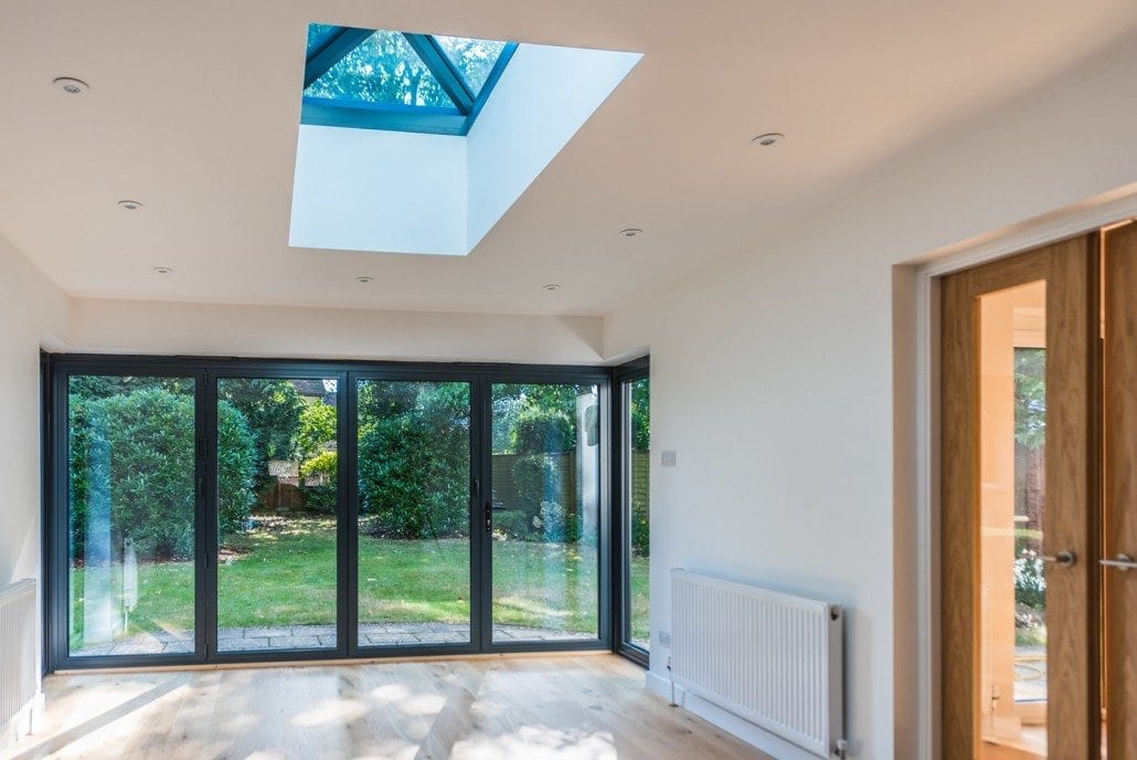 Smarts aluminium bifold doors open wide onto a garden, conservatory reinvented, Kelvedon