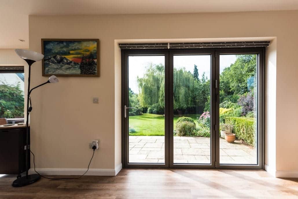 Interior of period property extension with roof lantern and bifold doors