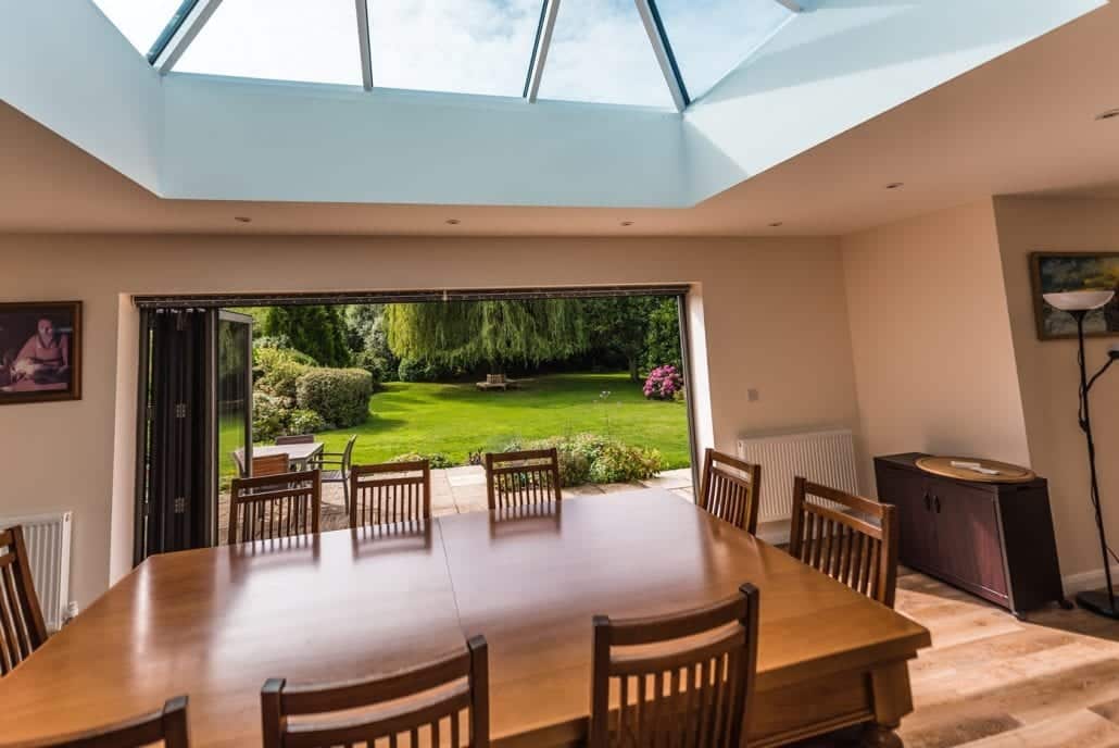 Dark grey aluminium roof lantern and bifold doors on Essex extension
