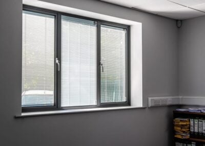 Smarts commercial aluminium door with full-length brushed handles, D A Cant Ltd