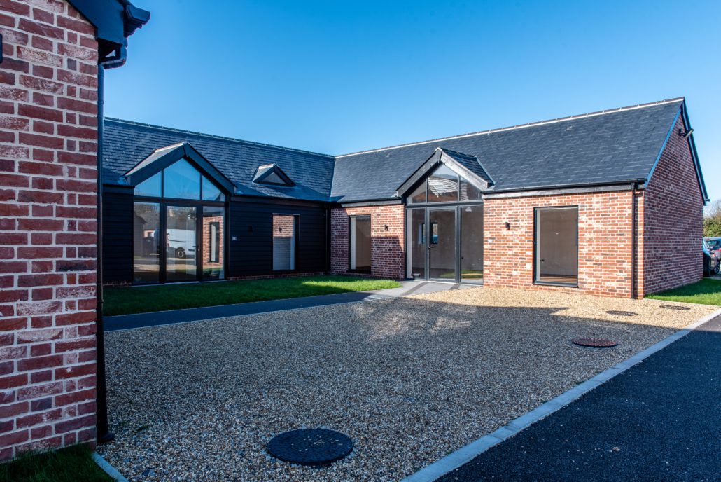 Smarts Alitherm 300 casement windows in matt black on a rural Essex barn conversion