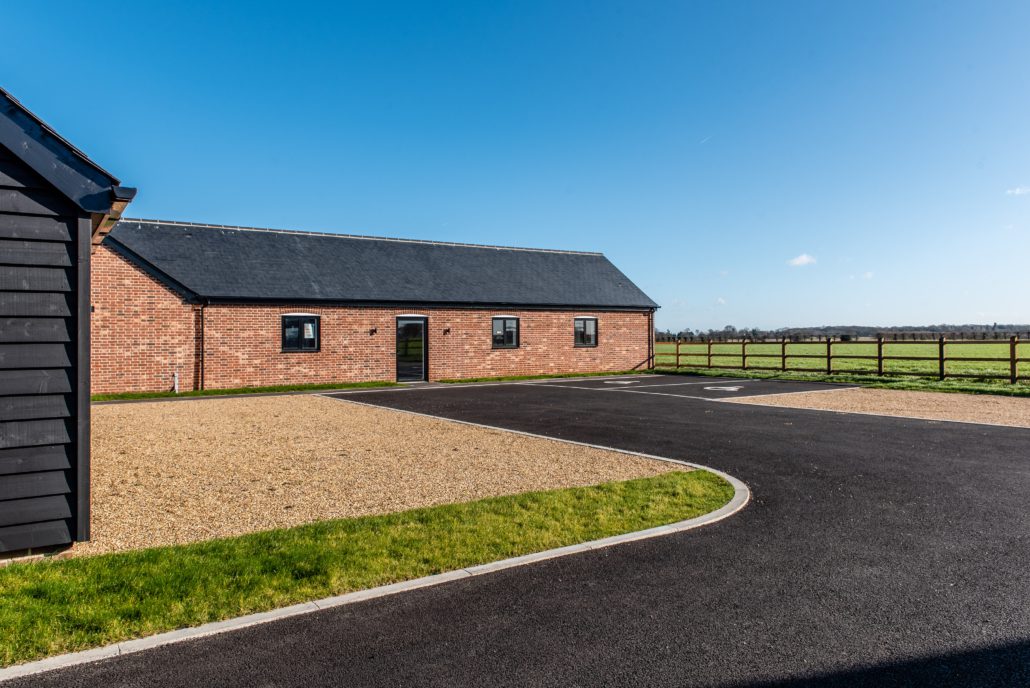 Smarts Visofold 1000 bifold doors fitted to a barn conversion commercial unit