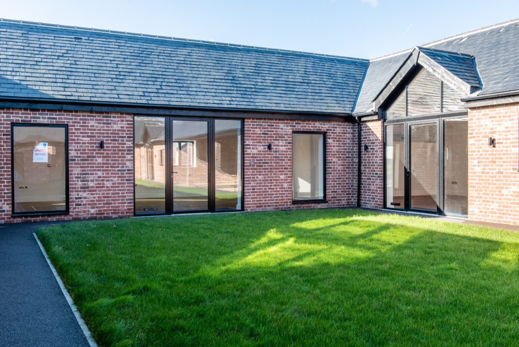 Rural Essex farm buildings converted to light commercial units with aluminium glazing