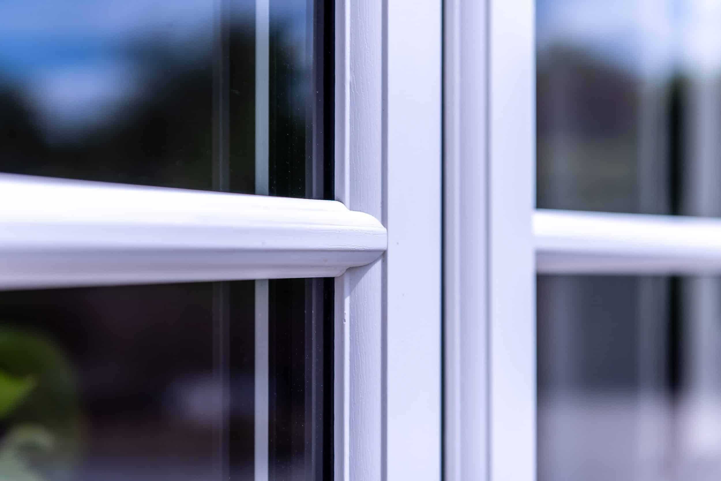 Duraflex Stormproof windows with astragal bars on the front elevation