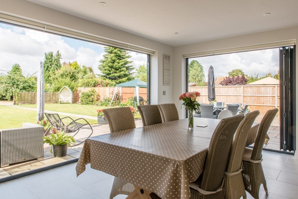 Interior view through bi-folding doors to rear garden during daytime