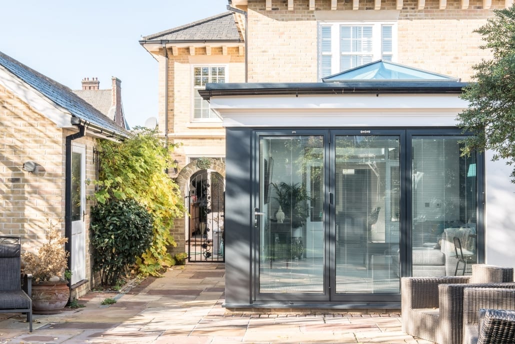 View through bifold doors to secret garden, Colchester