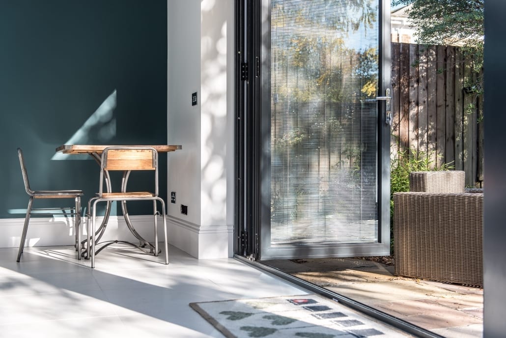 Wide view of bifold doors and lantern in Colchester remodel