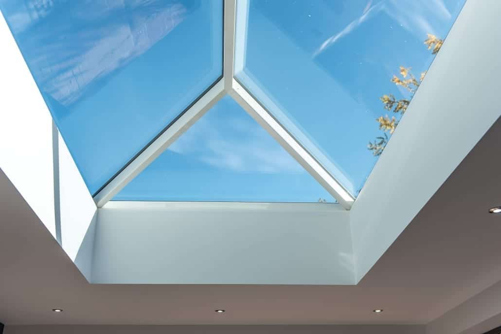 Bifold doors stacked open to garden, Colchester orangery