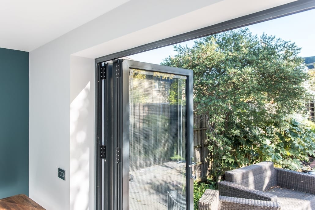 Interior shot of bifold doors and roof lantern, Colchester day-room