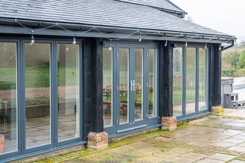 Upstairs flush sash window with flying mullion detail on barn conversion