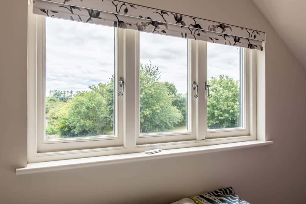 Bereco flush sash timber windows on barn with feather-edge cladding