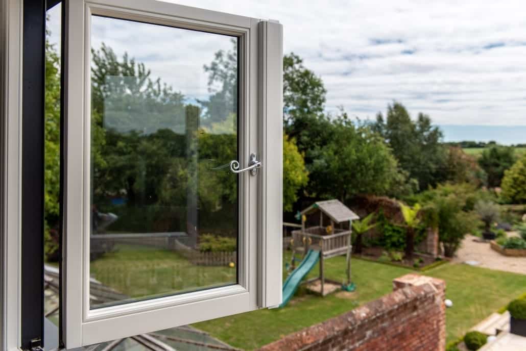Poolside bifold doors in anthracite aluminium, barn renovation