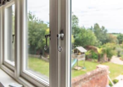 Barn renovation with aluminium bifold doors and timber windows, Essex/Suffolk