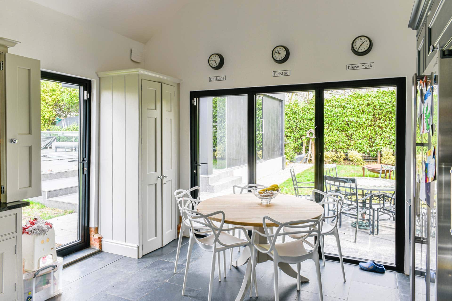 Three-leaf Smarts bifold doors in RAL 9005 Matt Black, kitchen and rear elevation