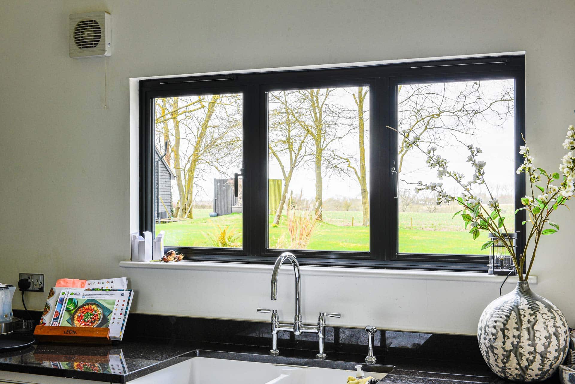 Heritage 47 sink window with art-deco style furniture, split into three panes